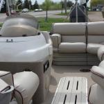 A full re-upholstery job on this boat with tan vinyl and burgundy piping. 